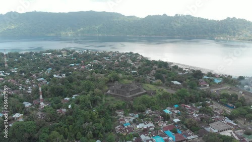 Aerial: flying over Bandaneira village Fort Belgica Indonesia Banda Islands Maluku, diving travel destination, old dutch colony for nutmeg. Native cinelike D-log color profile