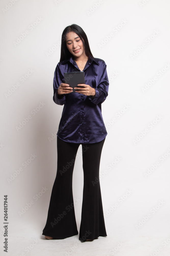 Young Asian woman with a computer tablet. Young Asian woman with a computer tablet.