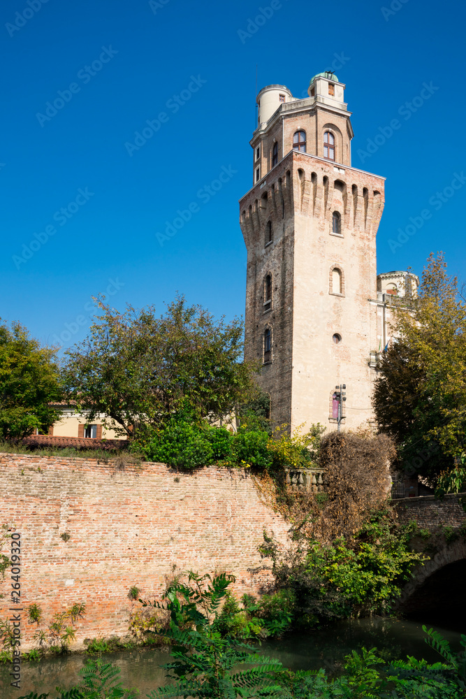 tower of Astronomical Observatory of Padua, Italy. Blue sky space for text