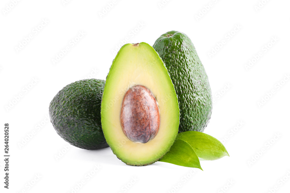 Ripe avocados with leaves isolated on white background. Healthy food Ripe avocados with leaves isolated on white background. Healthy food