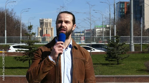 Journalist with urban on background close up portrait photo