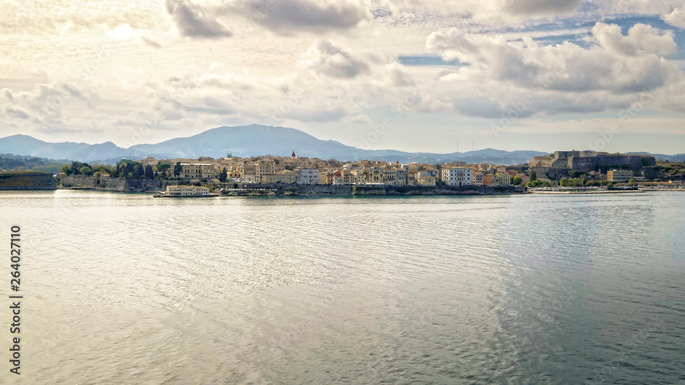 Town along the waterfront on Greek island of Corfu, Greece