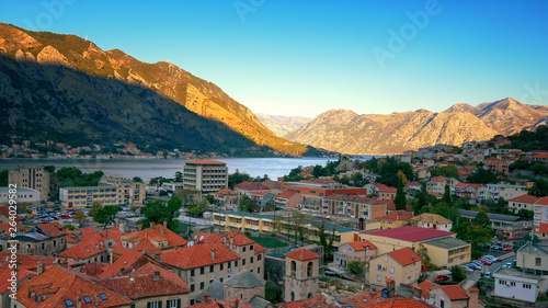 City of Kotor, Montenegro sits along the Bay of Kotor in the Adriatic Sea at sunrise