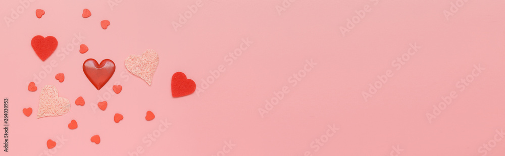 Pattern made of red hearts on pink background. Flat lay, top view, copy space
