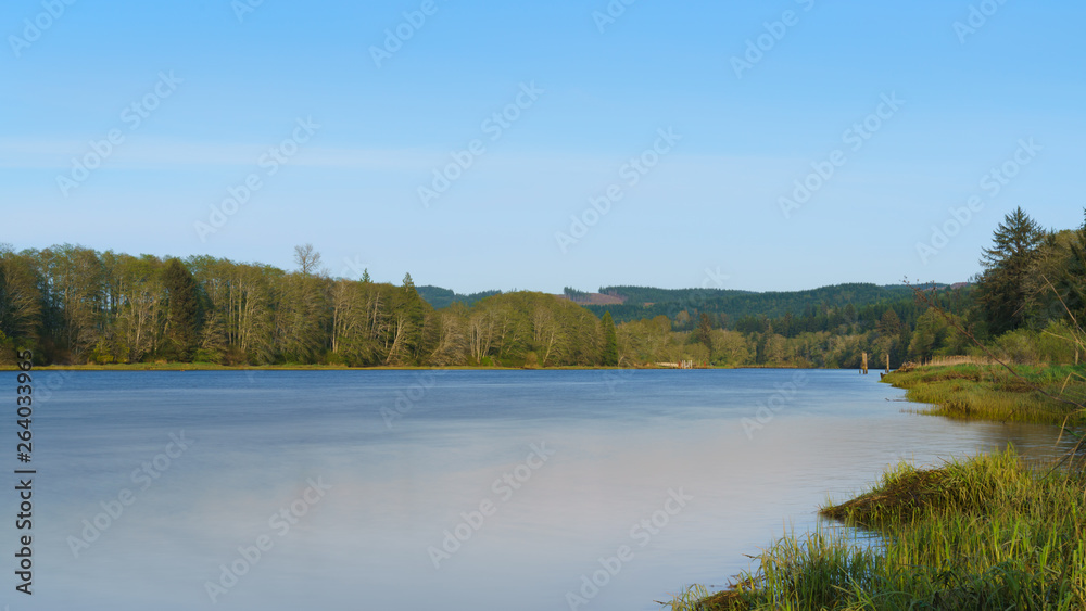 Afternoon Smooth River Scene in Wilderness Afternoon Smooth River Scene in Wilderness
