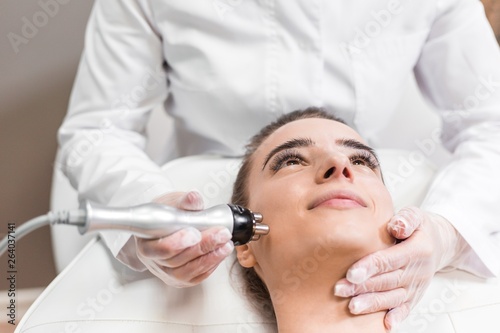 Woman gets native electro stimulating lifting therapy