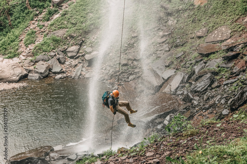 Man rappels Kaaterskill Falls in upstate New York, New England photo