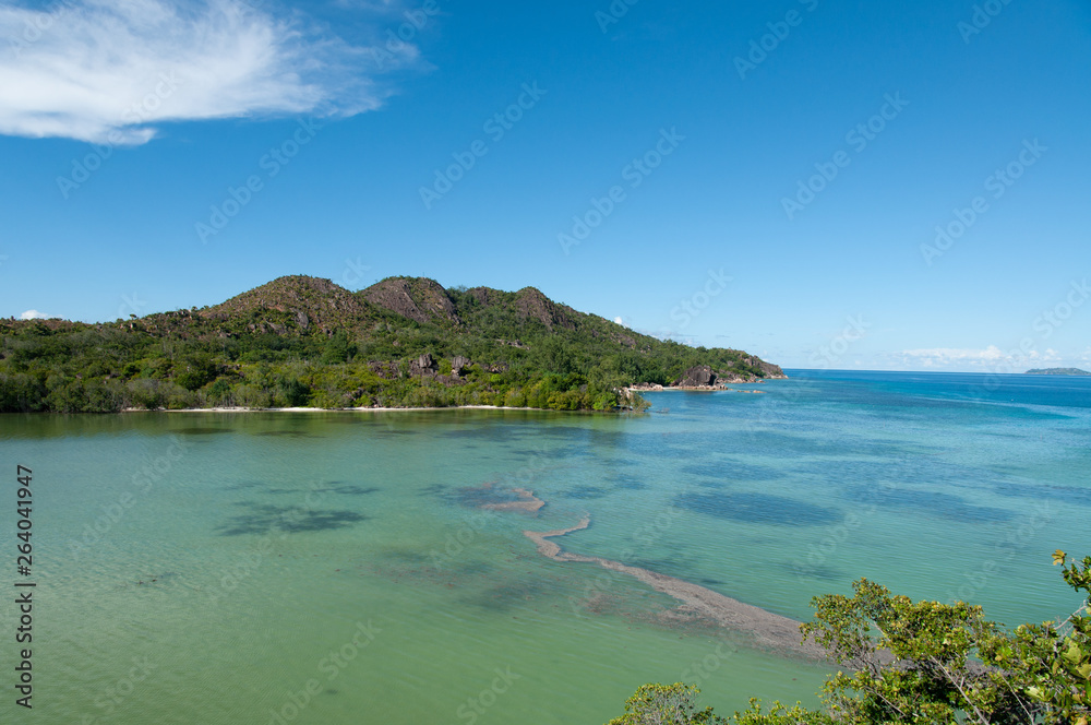 view of the coastline of the Marine National Park of Curieuse island, Seychelles