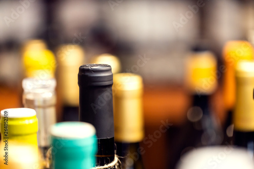 Neck of wine bottles in a liquor store in Europe