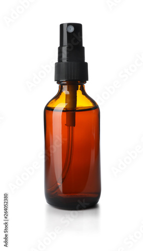 Bottle of essential oil isolated on white