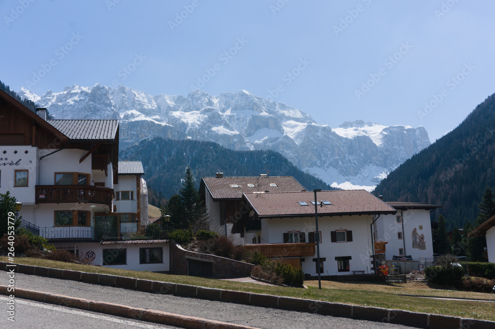 View of the rocky dolomite mountains above the village of wolkenstein in south tyrol, val gardena