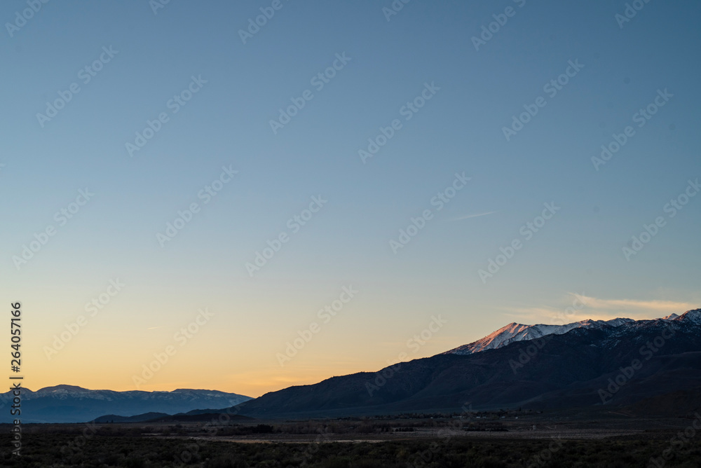 sunrise sky over mountain range Sierra Nevadas California