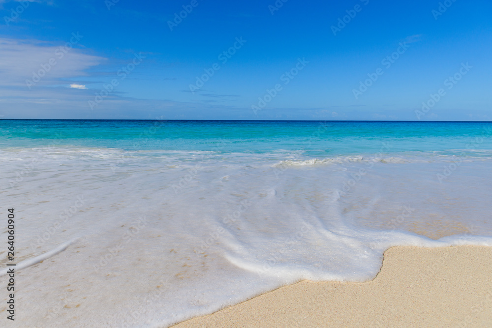 Waves and foam on Seychelles paradise beach Waves and foam on Seychelles paradise beach