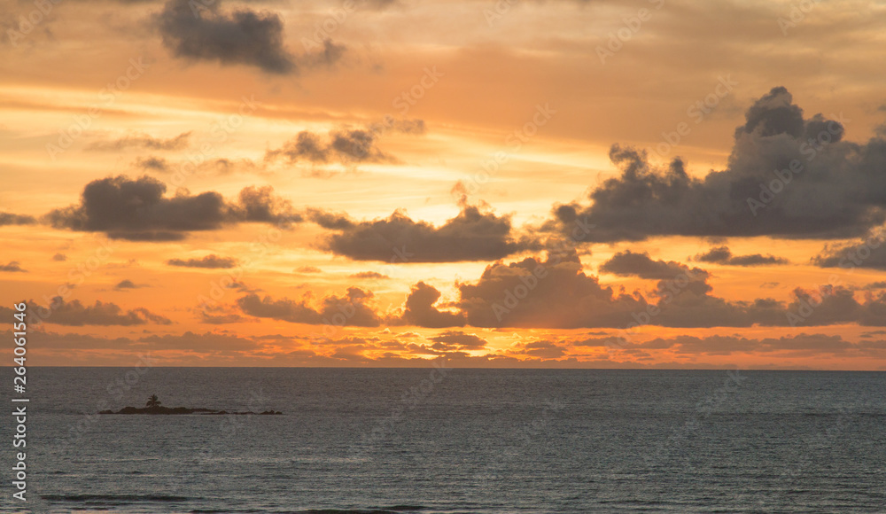 Spectacular golden sunrise over ocean