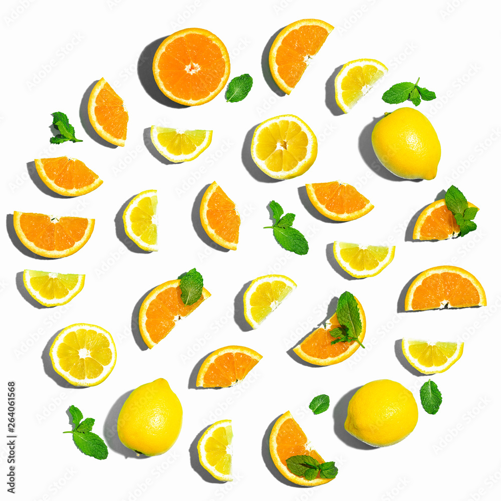 Collection of oranges and lemons overhead view flat lay Collection of oranges and lemons overhead view flat lay