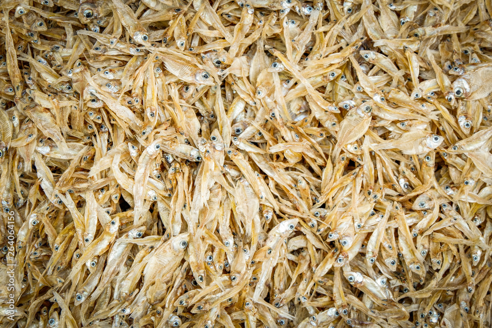 Dried small fish for fried crispy texture background  food in asian