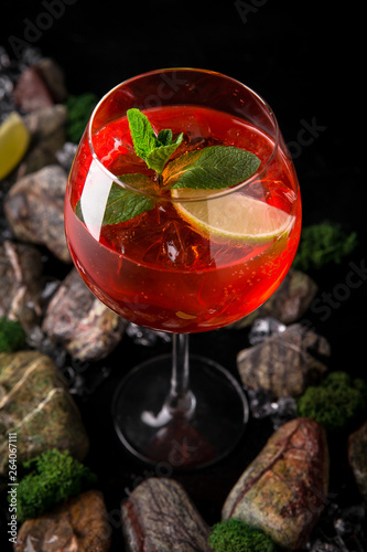 Wallpaper Mural Aperol syringe soft alcoholic drink on a black background with stones and ice. Cocktail card for a bar or restaurant. Torontodigital.ca