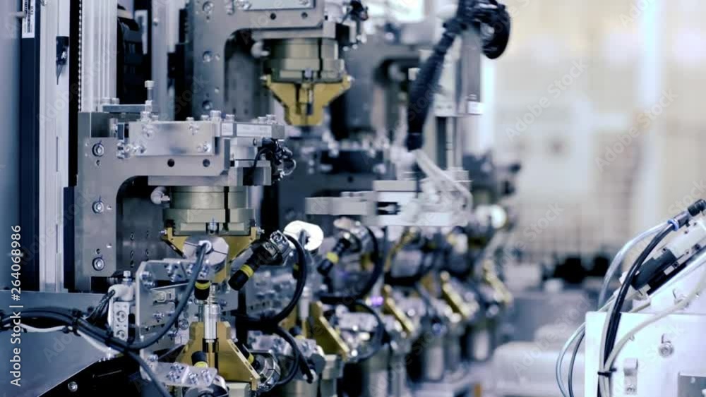 factory robotic automated arm in Manufacturing Line Assembling Product, automatic industrial mechanical robot hand automation