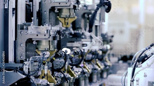 factory robotic automated arm in Manufacturing Line Assembling Product, automatic industrial mechanical robot hand automation