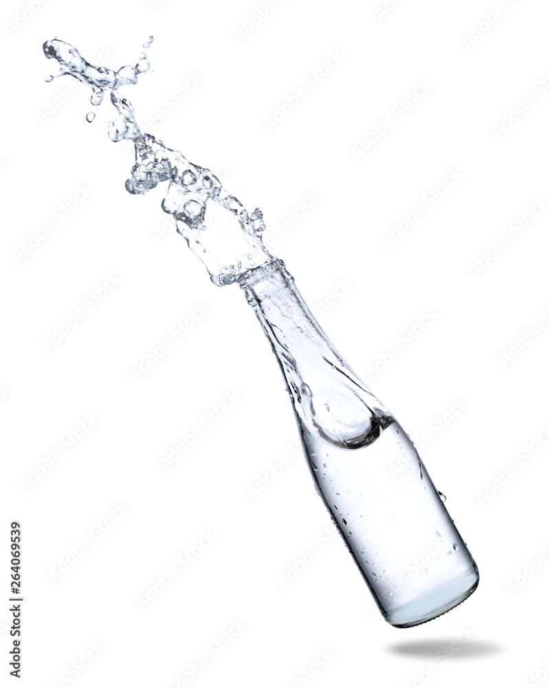 Water splashing out of glass bottle isolated on white background. Water splashing out of glass bottle isolated on white background.
