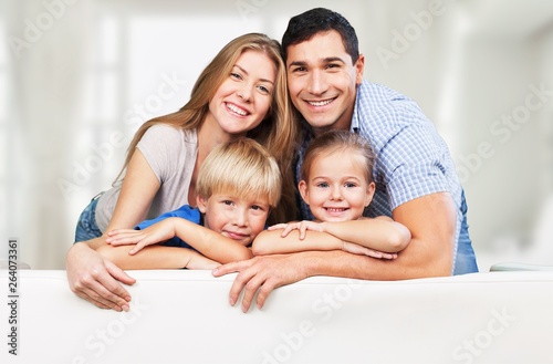 Beautiful smiling family on background