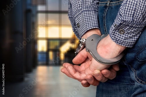 Fotografie Arrest bound bracelet bribe bribery business businessman