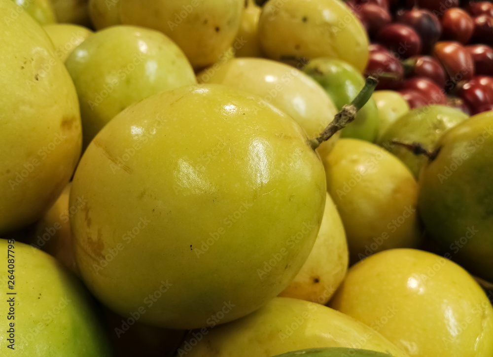 Yellow, delicious and juicy passionfruit, maracuya, Passiflora edulis produce