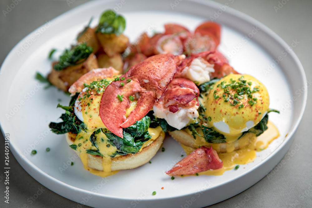 Eggs Benedict with lobster on bagels Eggs Benedict with lobster on bagels
