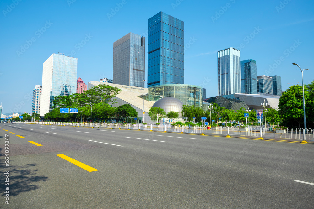 Shenzhen highway transportation and the high-rise building under the blue sky.