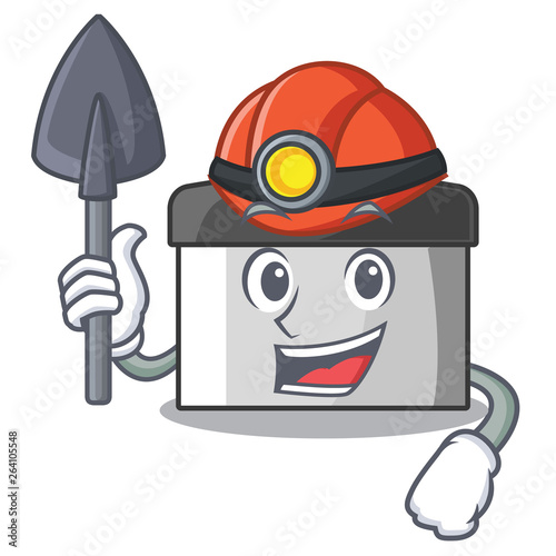 Miner pastry scraper on wooden mascot table