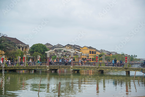 Hoi An city and its architecture, river, market and food.