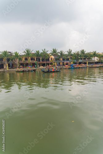 Hoi An city and its architecture, river, market and food.