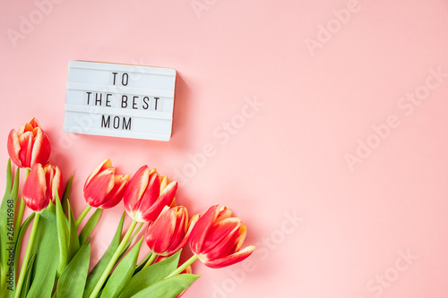 Fototapeta Naklejka Na Ścianę i Meble -  Mothers Day greeting card with red tulip flowers