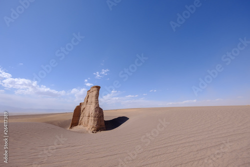 Sand, rocks and blue sky in the Kalut Shahdad Desert, Kalouts, Shahdad, Iran
