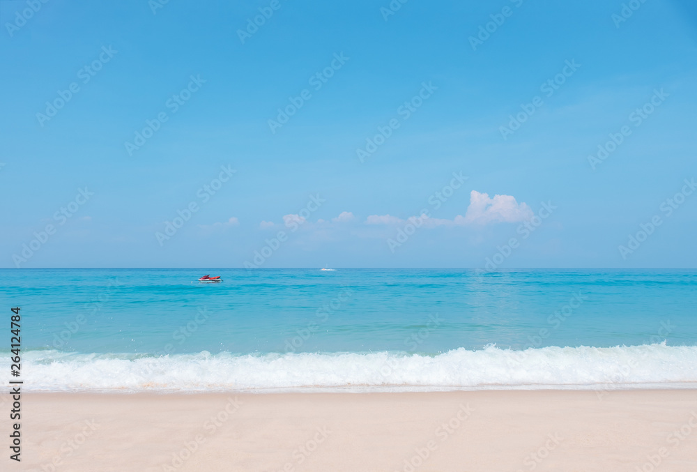 Beautiful blue ocean wave and jet ski on tropical beach. Sandy beach with sea and blue sky background. Summer, holiday -Image