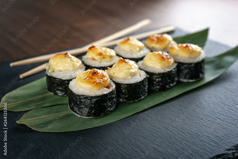 Rolls on bamboo leaves on shale Board Rolls on bamboo leaves on shale Board