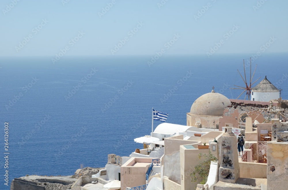 Blue Mediterranean Sea and Oia in the front 