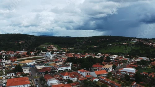 Drone footage of the downtown area of the city of Pirenopolis, Brazil, including aerial footage of a local church. photo