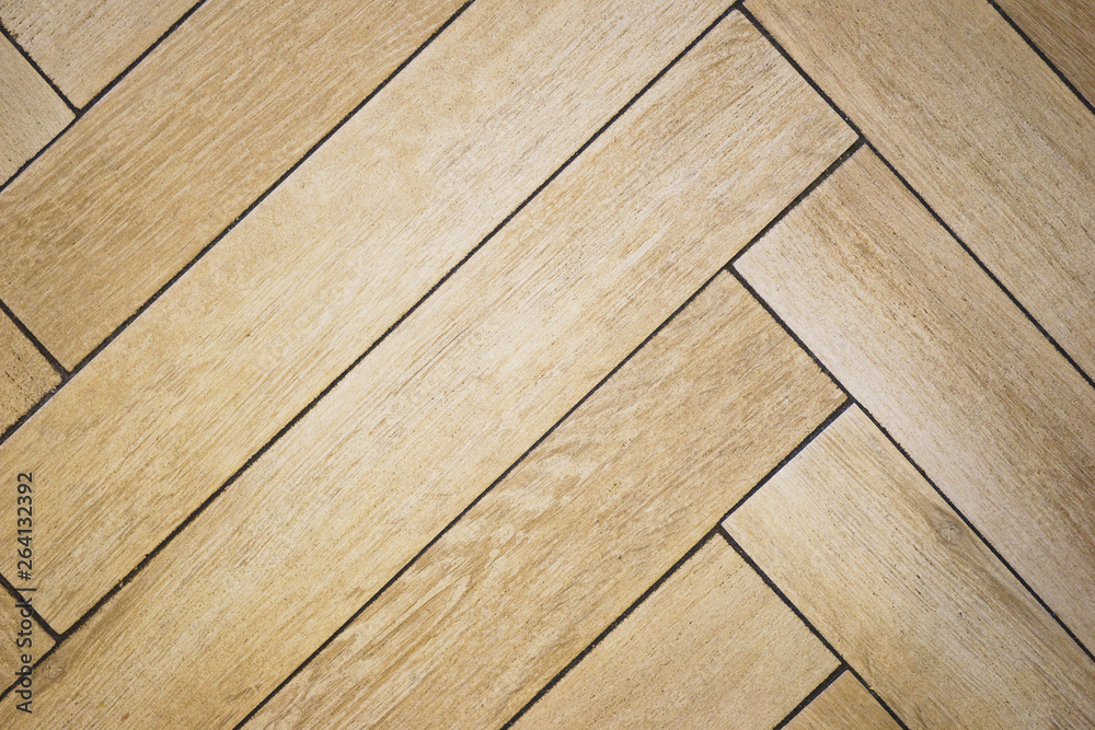 Fototapeta premium Texture of wooden floorboar and parquet closeup. Elements of finishing in the premises. 