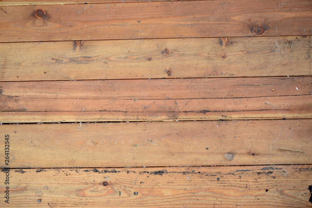 Obraz premium Wooden planks and logs.Wood texture. Wood texture. Wooden wall.Old wood. The color of the wood.Painted boards.