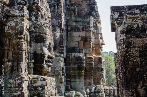 Smiling Faces of Bayon Temple in Angkor Thom is The Heritage of Khmer Empire at Siem Reap Province, Cambodia. photo