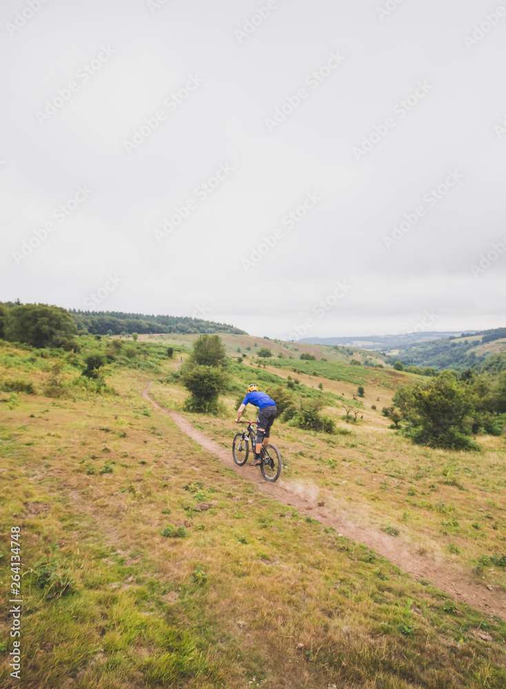 Mountain bike rider enjoying out in countryside