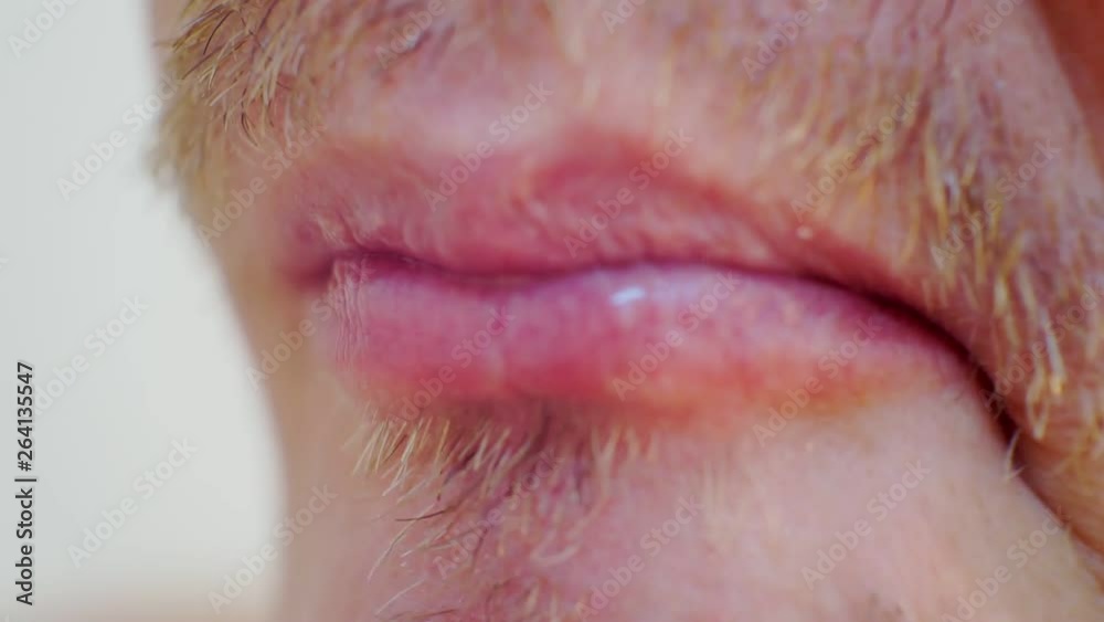male mouth eating a ripe juicy apple.close-up.shallow depth of field male mouth eating a ripe juicy apple.close-up.shallow depth of field