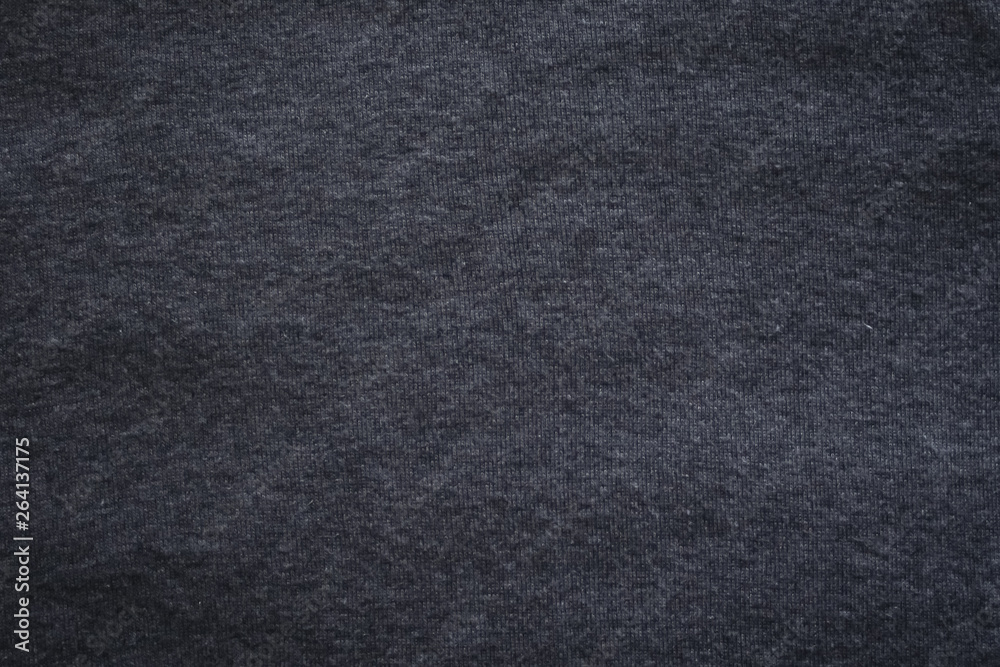 dark grey background. abstract texture of fleecy knitted fabric. dark grey background. abstract texture of fleecy knitted fabric.