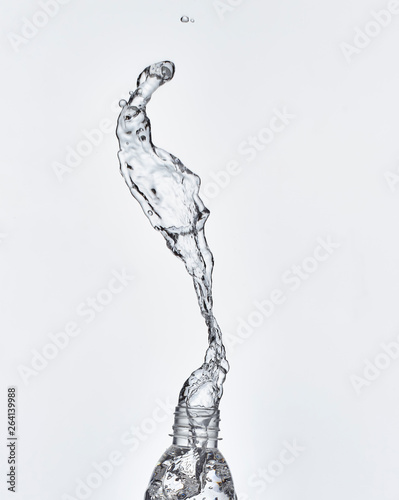 splash water coming out of the bottle