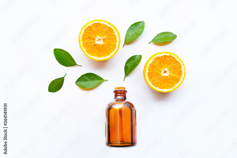Essential with fresh orange citrus fruits with leaves on white background. Essential with fresh orange citrus fruits with leaves on white background.
