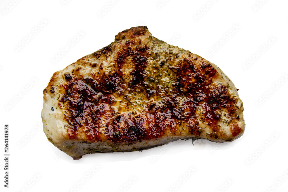 Isolated piece of grilled steak with spices