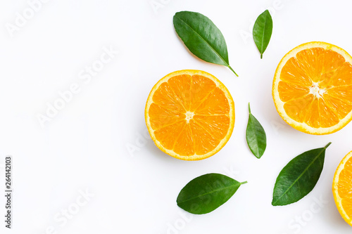 Top view of orange fruits and leaves isolated on white background.