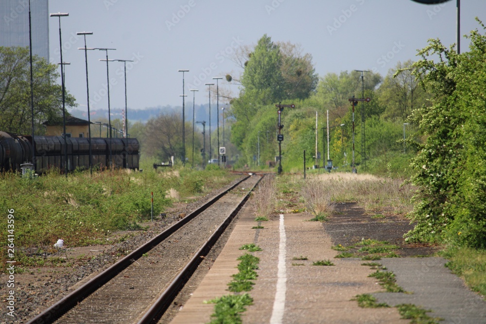 Fototapeta premium wild small town train station in the sunshine