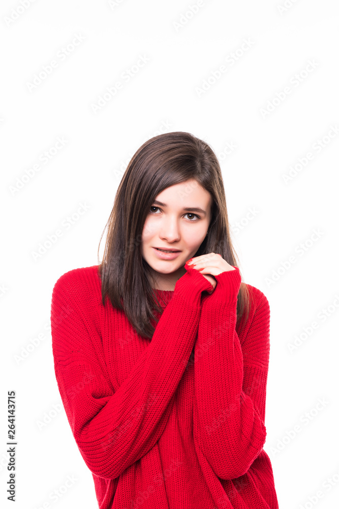 Smiling woman in red sweater over white background Smiling woman in red sweater over white background